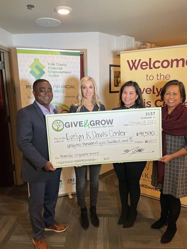 Green State Credit Union with check for Evelyn K Davis Center